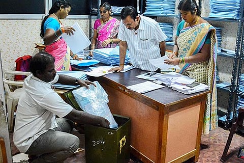 Officials arranging the election materials for the second phase of polling, at Ambattur panchayat office