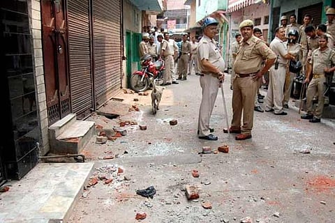 Policemen standing in street of riot-affected Muzaffarnagar in 2013 (PTI file photo)