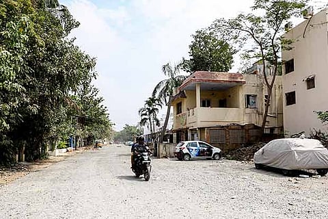 The work was stopped before laying tar and the half-laid 350-metre stretch is filled with gravel, giving rise