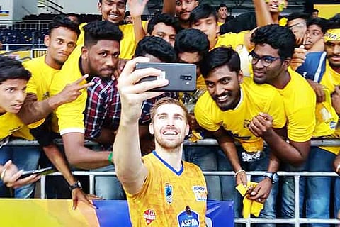 Rudy Verhoeff of Chennai Spartans takes a groupfie with fans at the Nehru Indoor Stadium