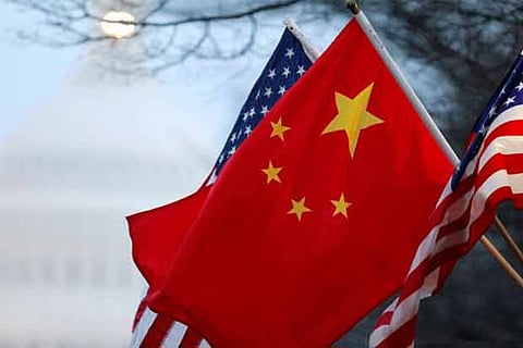 US, China hold more trade talks overshadowed by Kim visit
