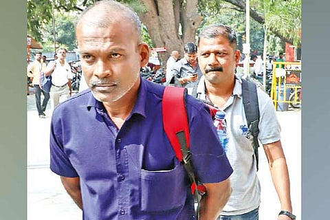 KV Sayan and ?Walayar? Manoj appear at the Egmore court on Friday