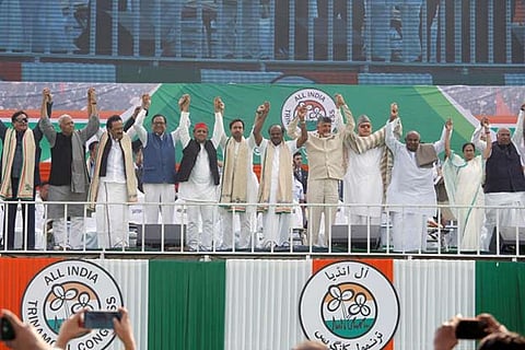 Leaders of India's main opposition parties join their hands together during United India rally