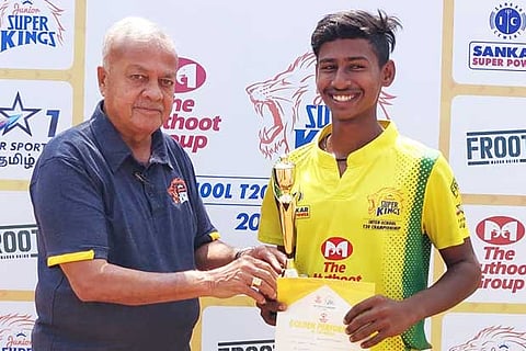 Kamaleshwaran (right) receives the MoM award