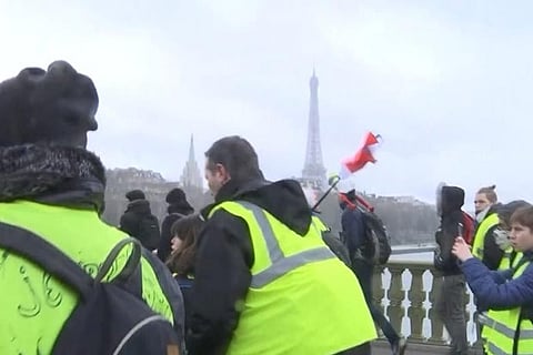 French 'yellow vests' defy Macron with fresh protests