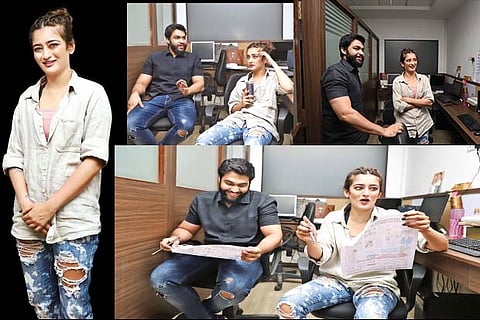 Abi and Akshara in the newsroom proofing the page