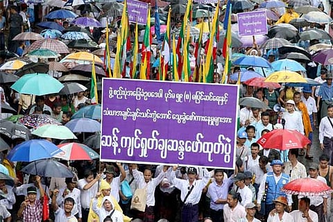 Suu Kyi's bid to reform charter sparks rival protests in Myanmar