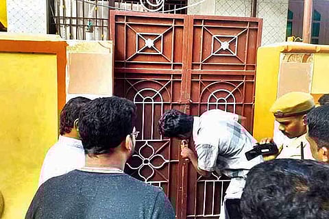 Locks of the house of Asarudeen being broken by NIA team at Muthupettai in Tiruvarur district on Saturday