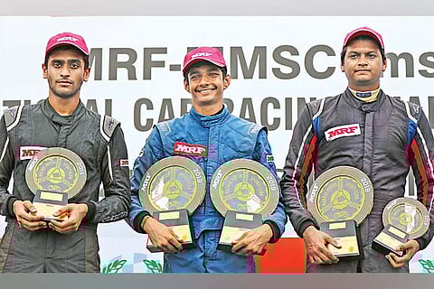 (L to R): Nayan Chatterjee, Sohil Shah, who won a double, and Vishnu Prasad