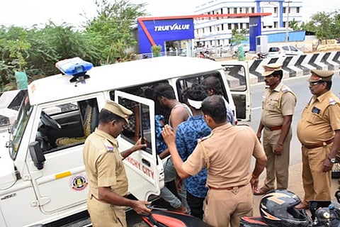 College students involved in a clash being taken to the police station in Tiruchy