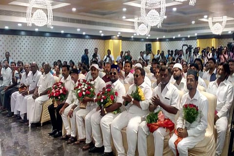A section of newly inducted members into AIADMK in Vellore on Sunday