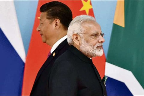 Chinese President Xi Jinping and Indian Prime Minister Narendra Modi