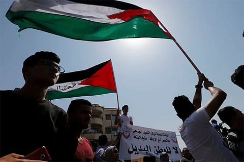 Palestinians urge Egypt, Jordan to reconsider going to U.S.-led conference