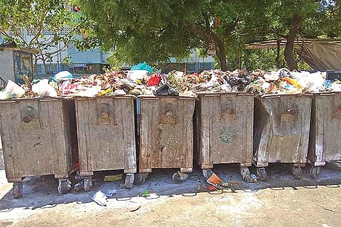 Garbage bins mark road borders at Ambattur Estate