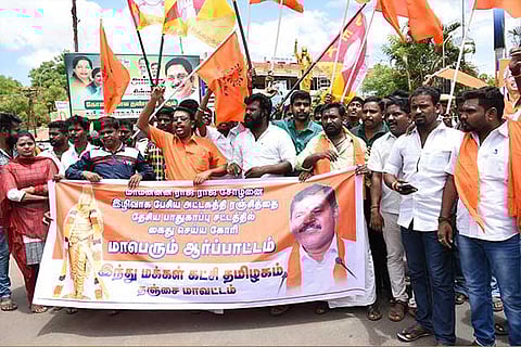 Members of Hindu Makkal Katchi raise slogans against the film director, in Thanjavur on Friday