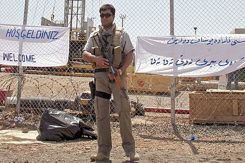 U.S. forces prepare to evacuate contractors from Iraqi base: military sources