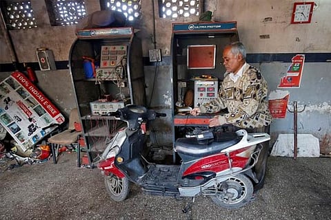 India asks scooter, bike makers to draw up plan for EVs: sources