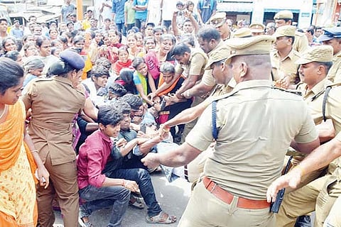 Students forcefully removed by police at Veerappanchatram in Erode on Monday