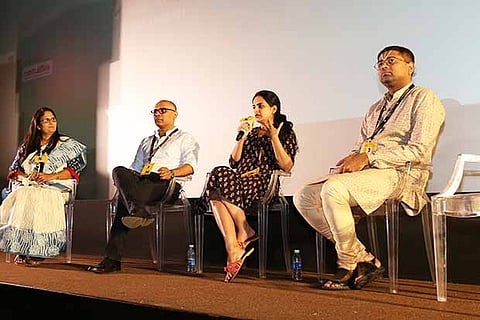 Guest speakers in conversation with the audience