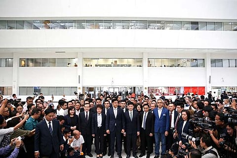 Thai Raksa Chart leader Preechapol Pongpanich and party members at the Constitutional Court