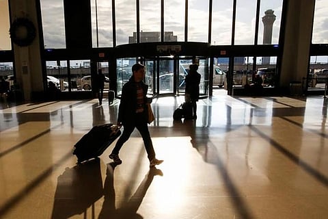 Travellers make their way through Newark Liberty International Airport