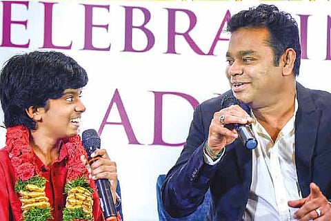 Music composer AR Rahman interacts with musical prodigy Lydian Nadhaswaram after he won in Chennai on Thursday