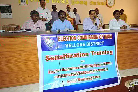 Vellore District Collector Raman addressing a meeting on election expenditure on Friday