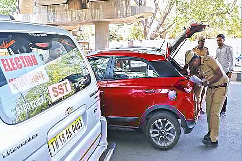 A surveillance team checking vehicles in Chennai on Sunday