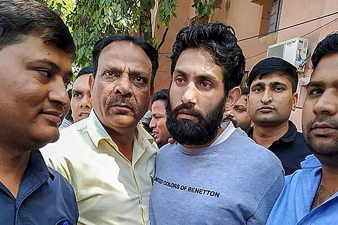 Jaish-e-Mohammad terrorist Sajjad Khan (3rd from left) arrested by Delhi Police Special Cell