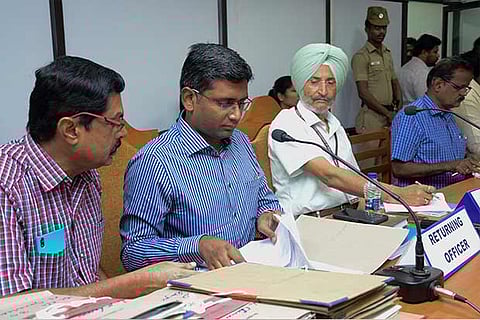 Returning Officers begin the scrutiny of nomination applications, in Chennai on Wednesday