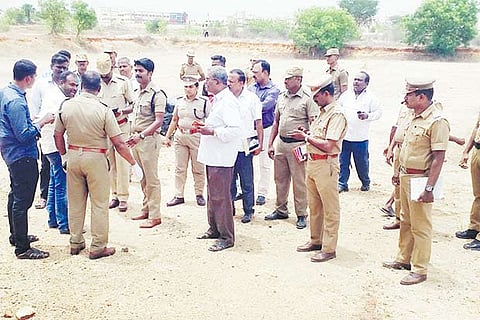 Superintendent of Police Sibi Chakravarthy and senior officer conducting an inquiry at the murder spot