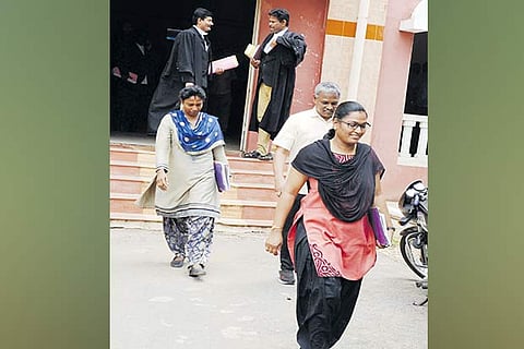 CB-CID sleuths come out of the court hall, after the hearing in Namakkal on Tuesday
