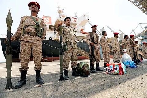 Yemen's Houthi movement forces are seen during withdrawal from Saleef port in Hodeidah province