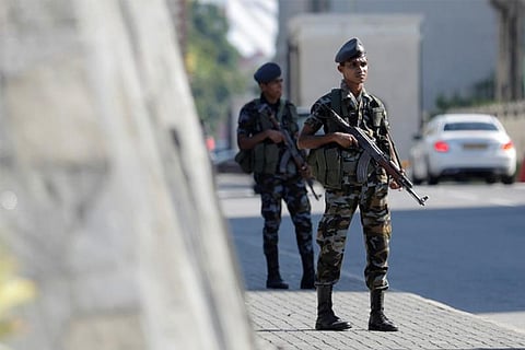 Lanka reimposes curfew as over 100 held for anti-Muslim riots
