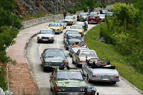 Old-timer Mercedes cars are seen driving in Imotski, Croatia