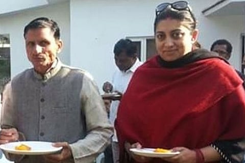 Surendra Singh with BJP MP Smriti Irani in this undated photo