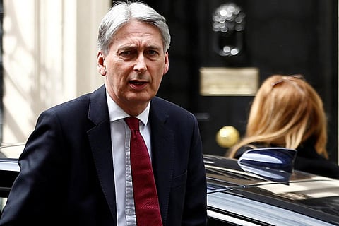 Hammond cautions PM candidates over no-deal Brexit and spending