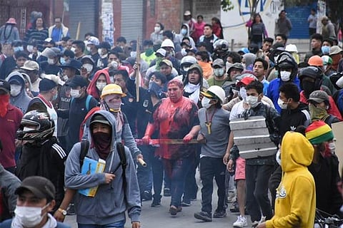 Protesters forcibly cut female Bolivia Mayor's hair