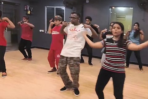 Jayanth (in white shirt) during a krumping session