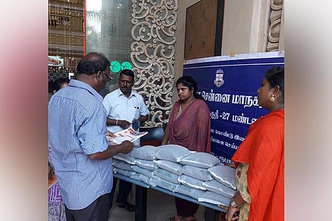 A stall at a shopping mall with packets of manure