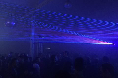 One smoke, two birds: Laser show and mosquito fogging