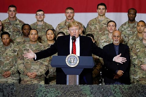 Trump makes unannounced Thanksgiving trip to Afghanistan, says Taliban talks back on