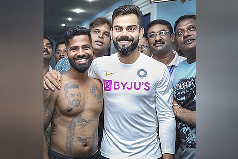 India captain Virat Kohli with a fan at Visakhapatnam