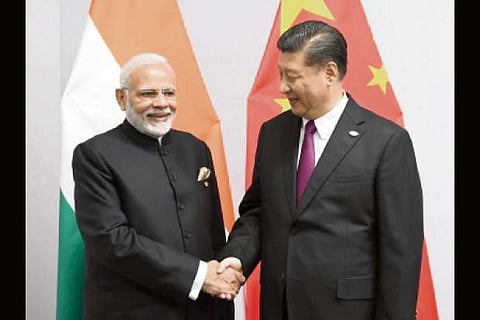 China moderates Kashmir stand ahead of Xi's India visit
