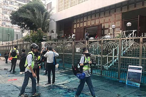 Apology accepted, Hong Kong's Muslims lament water cannon staining mosque