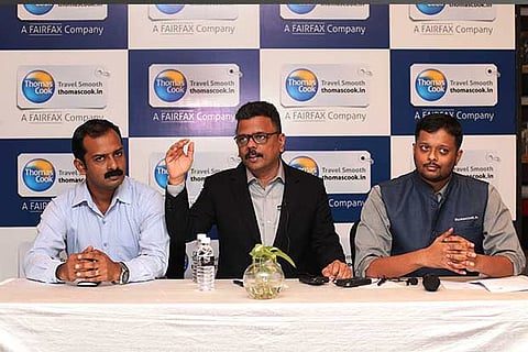 Rajeev Kale (centre) with senior executives