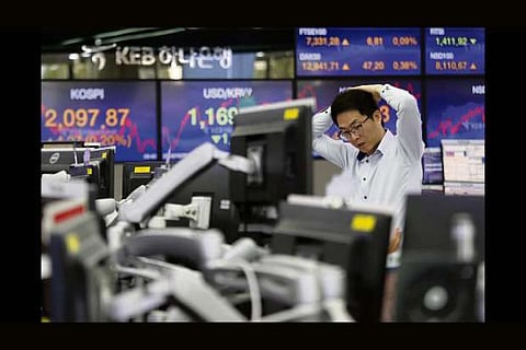 Asian markets tick lower as focus turns to Fed meeting