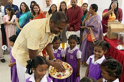 Sashi Cheliah with kids during his recent visit to the city
