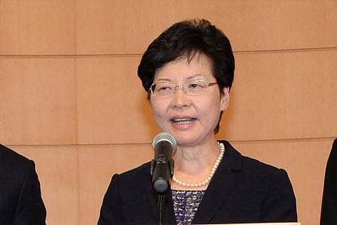 Lam rejects suggestion China refuses to let her quit