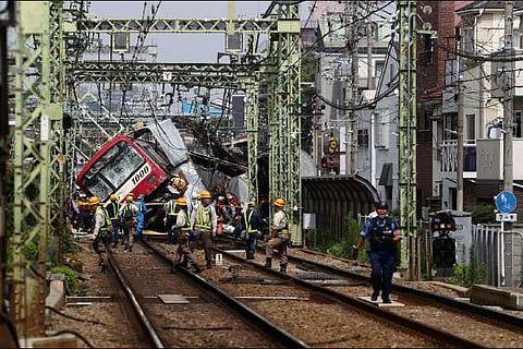 1 dead, over 30 hurt in Japan train-truck collision